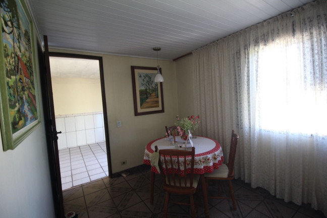 Imagem Casa com 4 Quartos à Venda, 131 m² em Uberaba - Curitiba