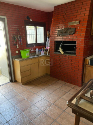 Imagem Casa com 4 Quartos à Venda, 480 m² em Santo Antônio - Porto Alegre