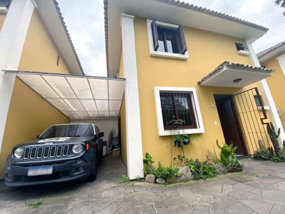 Imagem Casa de Condomínio com 3 Quartos à Venda, 102 m² em Partenon - Porto Alegre