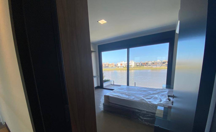 Imagem Casa de Condomínio com 4 Quartos à Venda, 240 m² em Marina - Xangri-lá Imagem Casa de Condomínio com 4 Quartos à Venda, 240 m² em Marina - Xangri-lá