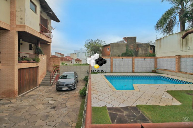 Imagem Casa com 3 Quartos à Venda, 183 m² em Ipanema - Porto Alegre
