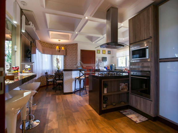 Imagem Casa com 4 Quartos à Venda, 442 m² em Vila Natal - Campos Do Jordão