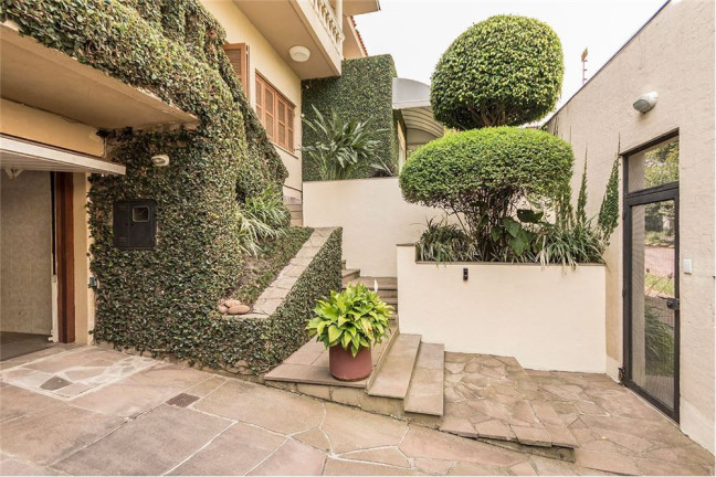 Imagem Casa com 4 Quartos à Venda,  em Três Figueiras - Porto Alegre