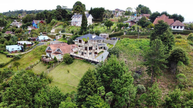 Imagem Casa com 4 Quartos à Venda, 240 m² em Vila Natal - Campos Do Jordão