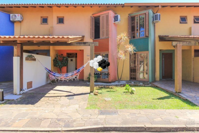 Imagem Casa com 4 Quartos à Venda, 117 m² em Cavalhada - Porto Alegre