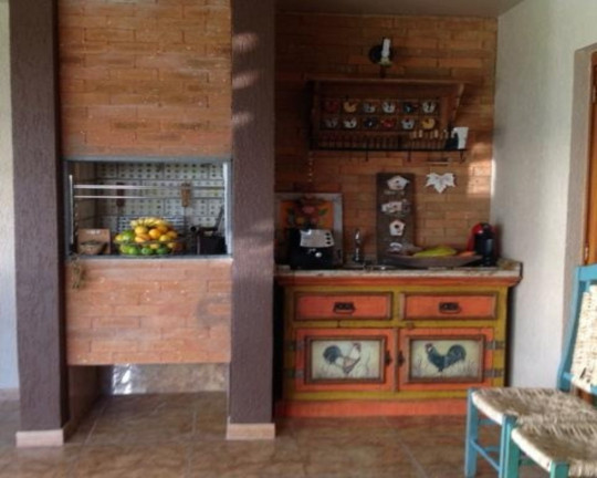 Imagem Casa com 4 Quartos à Venda, 286 m² em Bela Vista - Canoas