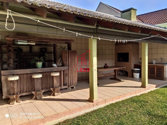 Imagem Casa com 4 Quartos à Venda, 320 m² em Curitiba