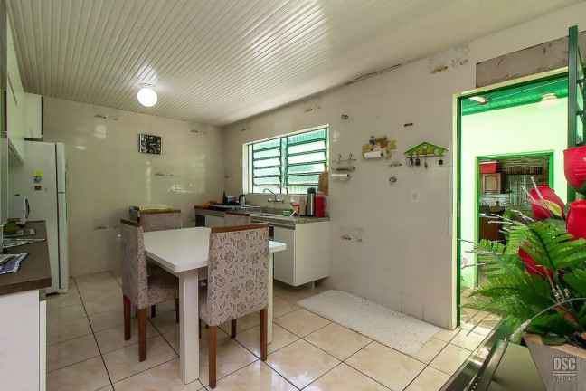 Imagem Casa com 3 Quartos à Venda, 216 m² em Vila Nova - Porto Alegre