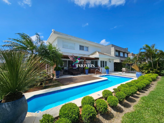 Imagem Casa de Condomínio com 4 Quartos à Venda, 327 m² em Centro - Xangri-lá