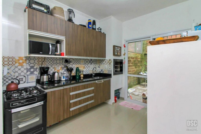 Imagem Casa com 2 Quartos à Venda, 87 m² em Campo Novo - Porto Alegre Imagem Casa com 2 Quartos à Venda, 87 m² em Campo Novo - Porto Alegre