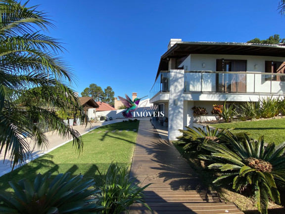 Imagem Casa com 4 Quartos à Venda, 204 m² em Centenário - Torres