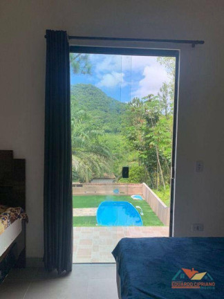 Imagem Casa com 2 Quartos à Venda, 120 m² em Jardim Capricórnio - Caraguatatuba