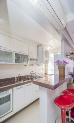 Imagem Apartamento com 3 Quartos à Venda, 66 m² em Santo Antônio - Porto Alegre Imagem Apartamento com 3 Quartos à Venda, 66 m² em Santo Antônio - Porto Alegre