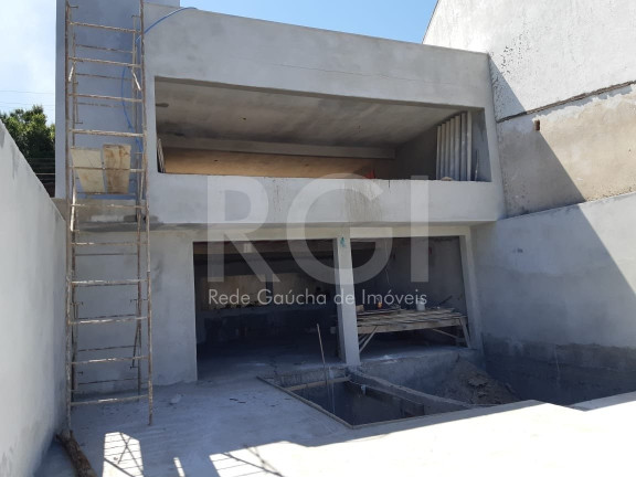 Imagem Casa com 3 Quartos à Venda, 290 m² em Santo Antônio - Porto Alegre