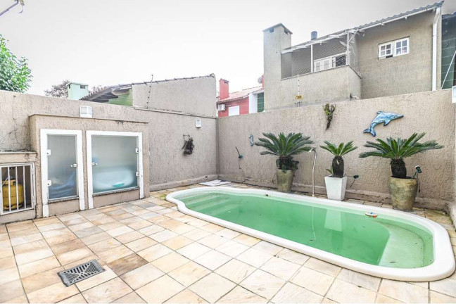 Imagem Casa com 3 Quartos à Venda, 152 m² em Hípica - Porto Alegre Imagem Casa com 3 Quartos à Venda, 152 m² em Hípica - Porto Alegre