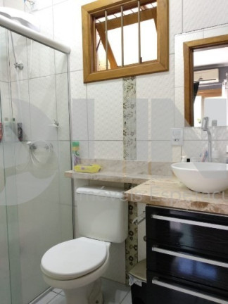 Imagem Casa com 3 Quartos à Venda, 94 m² em Vila Nova - Porto Alegre