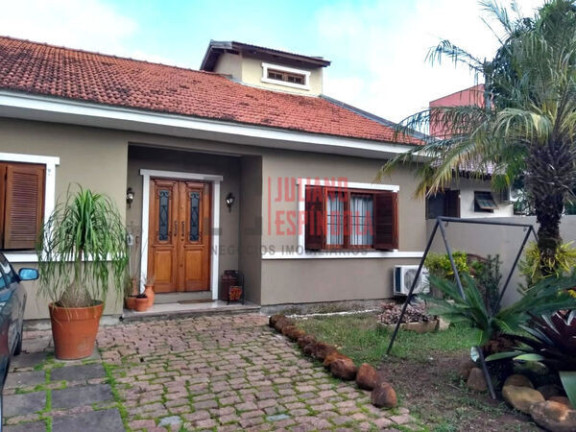 Imagem Casa com 3 Quartos à Venda, 150 m² em Espírito Santo - Porto Alegre Imagem Casa com 3 Quartos à Venda, 150 m² em Espírito Santo - Porto Alegre