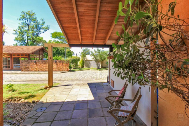 Imagem Casa com 4 Quartos à Venda, 117 m² em Cavalhada - Porto Alegre