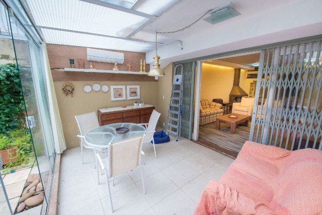 Imagem Casa com 4 Quartos à Venda, 272 m² em Rio Branco - Porto Alegre