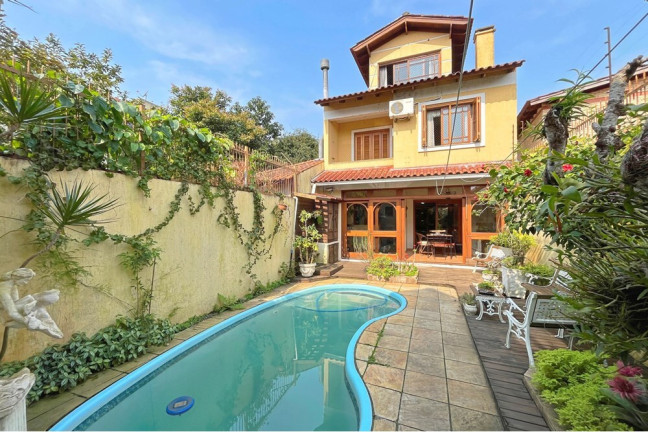 Imagem Casa com 5 Quartos à Venda,  em Ipanema - Porto Alegre