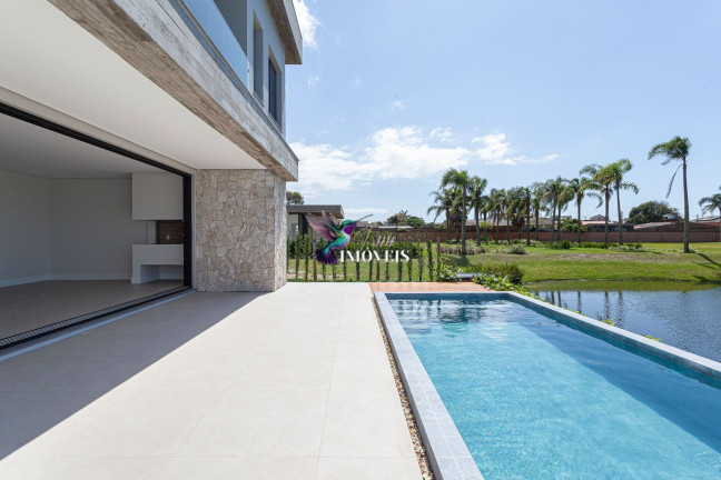 Imagem Casa de Condomínio com 4 Quartos à Venda, 359 m² em Centro - Torres