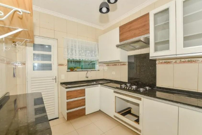 Imagem Casa com 3 Quartos à Venda, 190 m² em Novo Mundo - Curitiba Imagem Casa com 3 Quartos à Venda, 190 m² em Novo Mundo - Curitiba