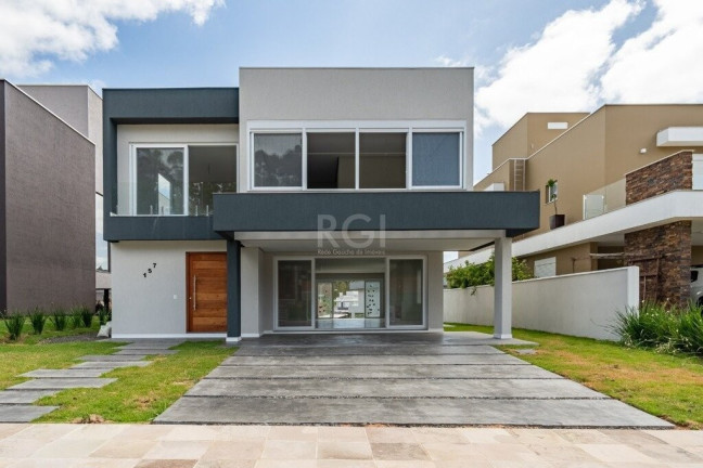 Imagem Imóvel com 3 Quartos à Venda, 300 m² em Vila Nova - Porto Alegre Imagem Imóvel com 3 Quartos à Venda, 300 m² em Vila Nova - Porto Alegre