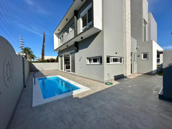 Imagem Casa com 4 Quartos à Venda, 262 m² em Centro - Capao Da Canoa