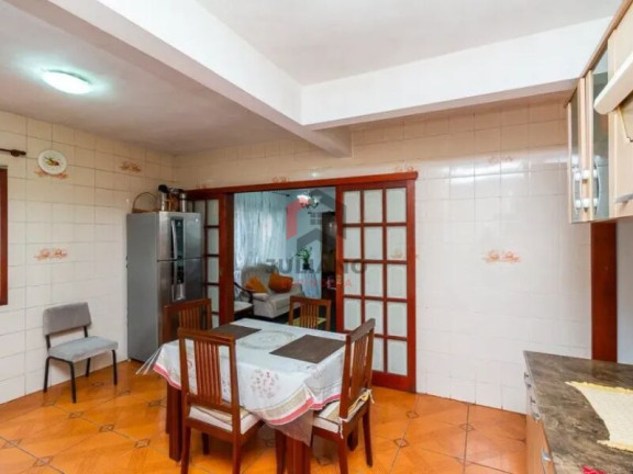 Imagem Casa com 4 Quartos à Venda, 280 m² em Vila Jardim - Porto Alegre