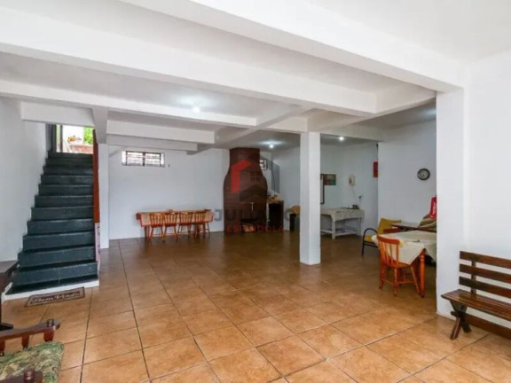 Imagem Casa com 4 Quartos à Venda, 280 m² em Vila Jardim - Porto Alegre