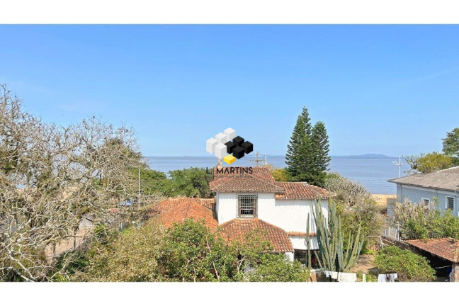 Imagem Casa de Condomínio com 3 Quartos à Venda, 254 m² em Ipanema - Porto Alegre