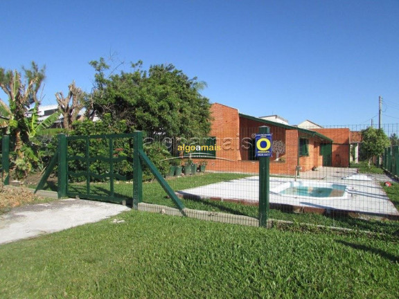 Imagem Casa com 4 Quartos à Venda, 209 m² em Centro - Xangri-lá Imagem Casa com 4 Quartos à Venda, 209 m² em Centro - Xangri-lá