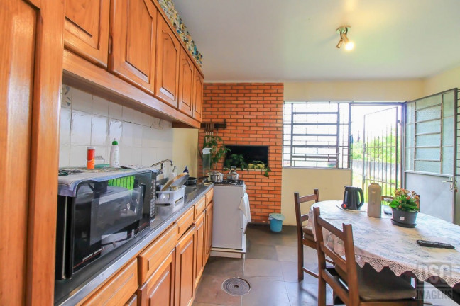 Imagem Casa com 3 Quartos à Venda, 299 m² em Glória - Porto Alegre