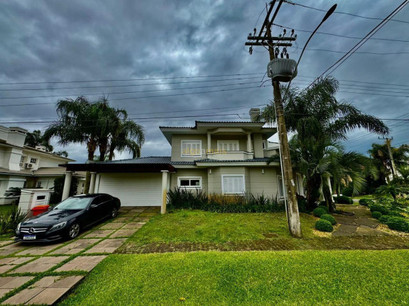 Imagem Casa com 4 Quartos à Venda, 428 m² em Condominio Atlantida Lagos Park - Xangri-lá Imagem Casa com 4 Quartos à Venda, 428 m² em Condominio Atlantida Lagos Park - Xangri-lá