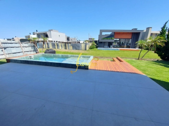 Imagem Casa de Condomínio com 5 Quartos à Venda, 327 m² em Remanso - Xangri-la