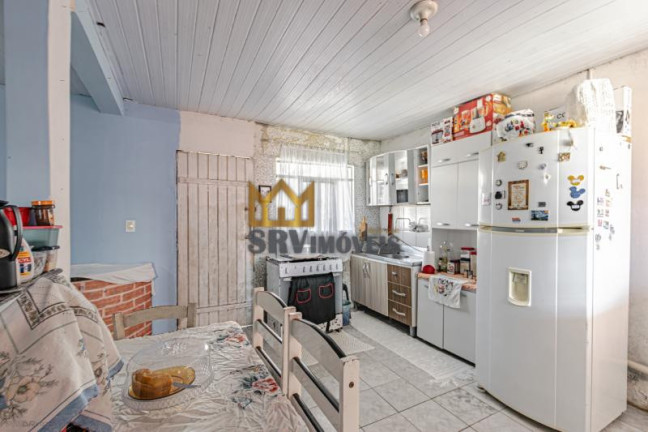 Imagem Casa com 2 Quartos à Venda, 55 m² em Uberaba - Curitiba