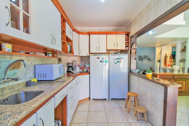 Imagem Casa com 3 Quartos à Venda, 198 m² em Cavalhada - Porto Alegre
