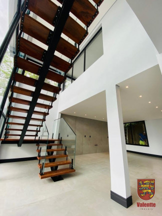 Imagem Casa com 5 Quartos à Venda, em Cacupé - Florianópolis Imagem Casa com 5 Quartos à Venda, em Cacupé - Florianópolis