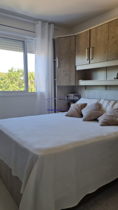 Imagem Imóvel com 2 Quartos à Venda, 57 m² em Vila Nova - Porto Alegre