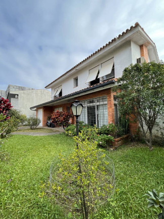 Imagem Casa com 5 Quartos à Venda, 232 m² em Menino Deus - Porto Alegre Imagem Casa com 5 Quartos à Venda, 232 m² em Menino Deus - Porto Alegre