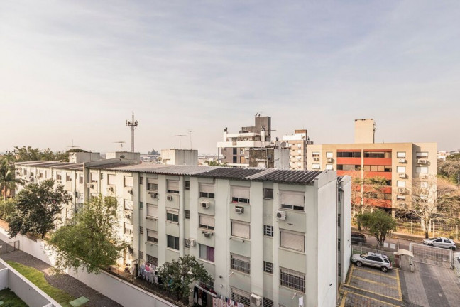 Imagem Imóvel com 2 Quartos à Venda, 53 m² em Jardim Lindóia - Porto Alegre