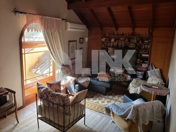 Imagem Casa com 4 Quartos à Venda, 236 m² em Agronomia - Porto Alegre