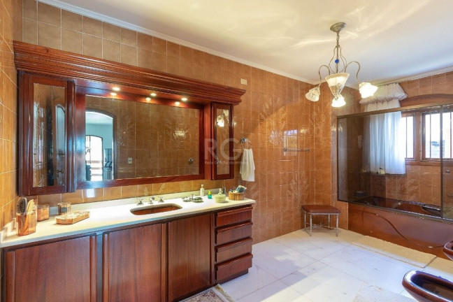 Imagem Casa com 4 Quartos à Venda, 725 m² em Vila Assunção - Porto Alegre