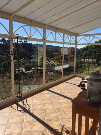 Imagem Casa com 6 Quartos à Venda, 1 m² em Vila Capivari - Campos Do Jordão