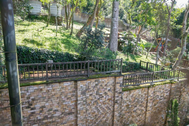 Imagem Casa de Condomínio com 4 Quartos à Venda, 477 m² em Pedra Redonda - Porto Alegre