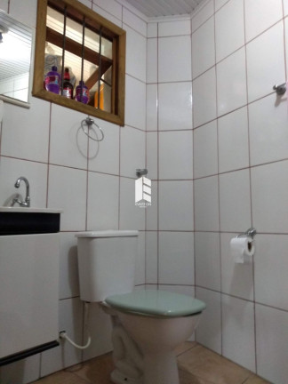 Imagem Casa com 4 Quartos à Venda, 270 m² em Duque De Caxias - Santa Maria