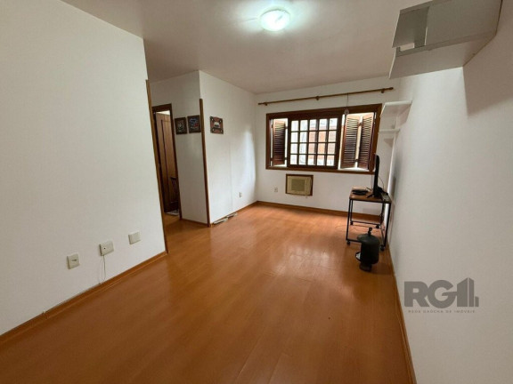 Imagem Apartamento com 1 Quarto à Venda, 42 m² em Jardim Botânico - Porto Alegre