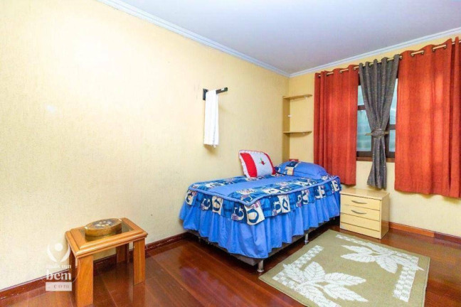Imagem Sobrado com 4 Quartos à Venda, 398 m² em Bacacheri - Curitiba