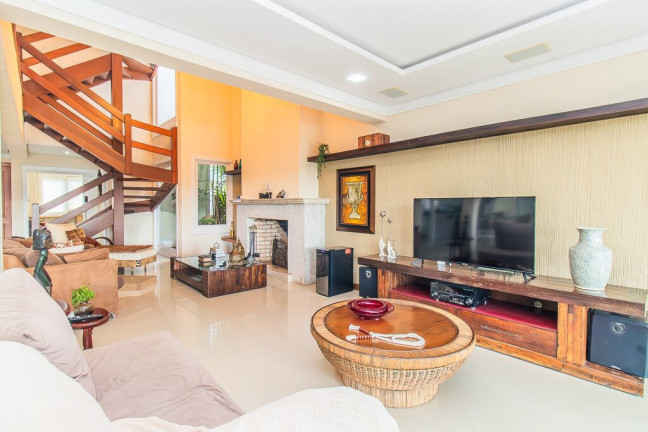 Imagem Casa de Condomínio com 4 Quartos à Venda, 387 m²