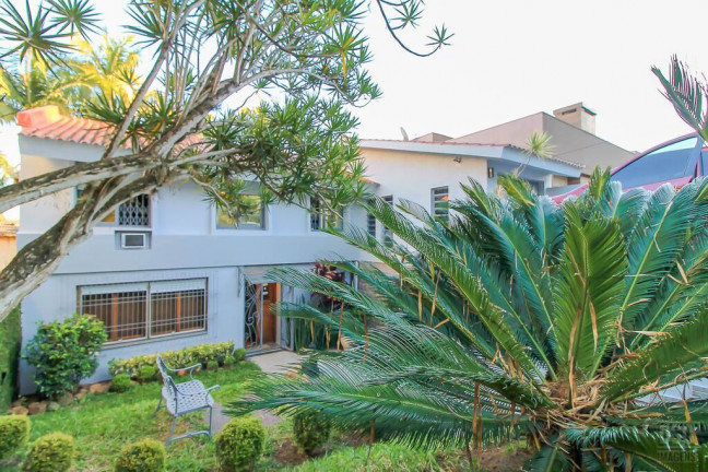 Imagem Casa com 4 Quartos à Venda, 321 m² em Vila Assunção - Porto Alegre Imagem Casa com 4 Quartos à Venda, 321 m² em Vila Assunção - Porto Alegre